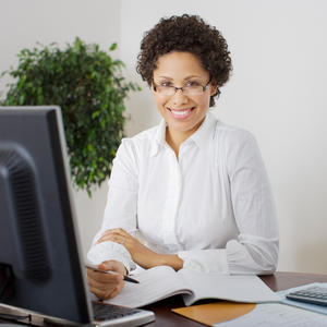 Social Worker at a Computer